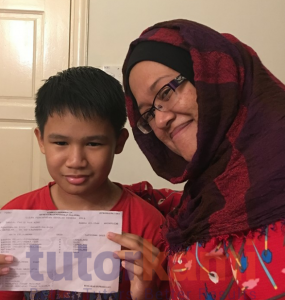 TutorKami of the month Cikgu Nurul with student with excellent results in exams